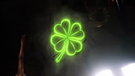 reaching upward, person with glowing neon green four-leaf clover in animation