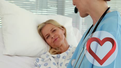 animación del icono del corazón sobre el médico caucásico con la paciente caucásica
