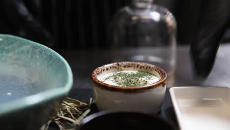 chef preparing a creamy dish
