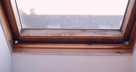 lockdown shot of window opening at home
