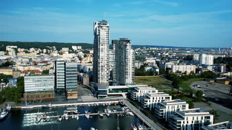 aerial view of sea towers, gdynia, with marina and cityscape