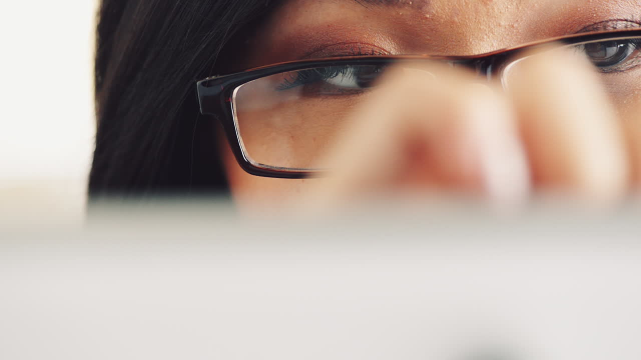 Attractive young woman using digital tablet computer touchscreen ipad