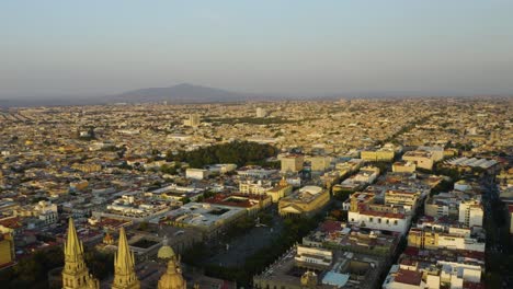 backwards aerial reveal guadalajara cathedral, teatro degollado