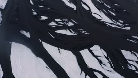 aerial top down shot of glacial river delta in eldvatn,south iceland