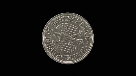 germany 1 deutsche mark 1958 obverse with federal eagle emblem, macro loop on black background