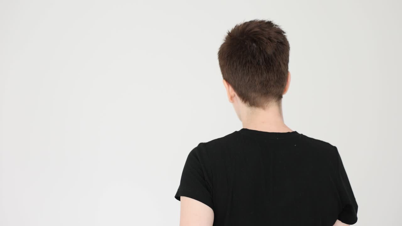 A person from the back wearing a t-shirt