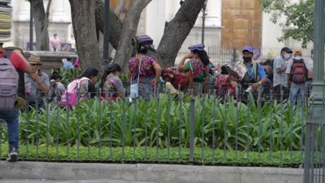 street vendor selling hats in a park