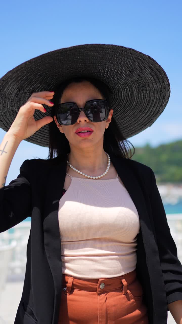 Stylish Woman in Summer Fashion by the Sea