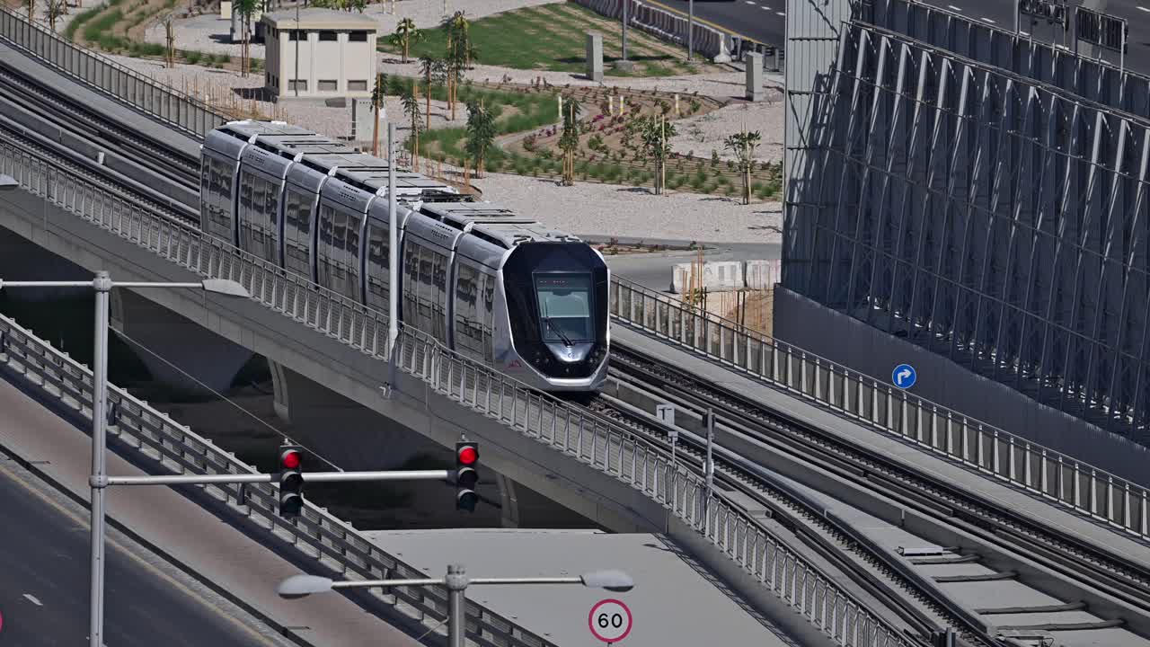 A Dubai Tram moves along Sheikh Zayed Road at Dubai Marina in the UAE.