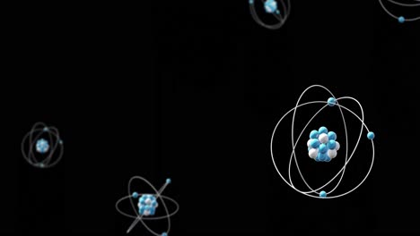 animación de modelos de átomos que giran sobre un fondo negro