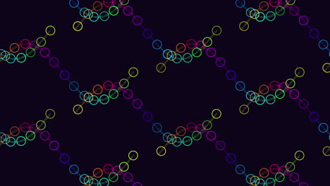 vibrant connected circles in gradient colors on black background