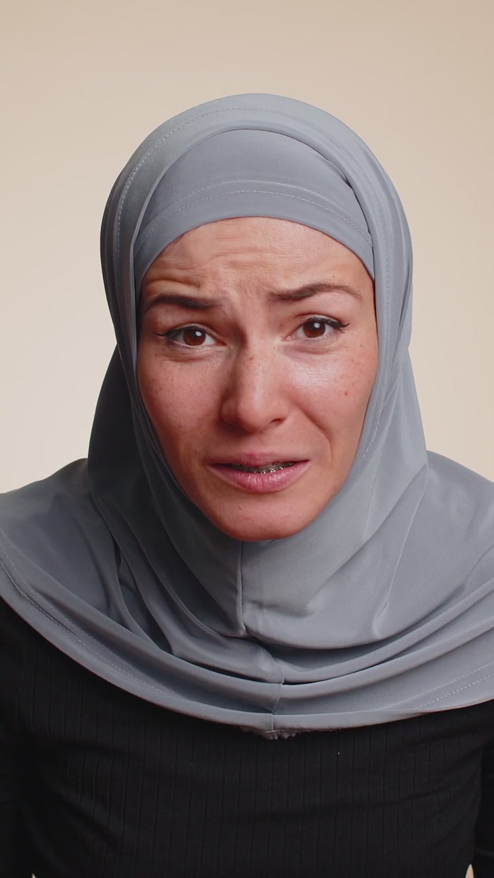 Woman raising hands in indignant expression ask why what reason of failure demonstrating disbelief