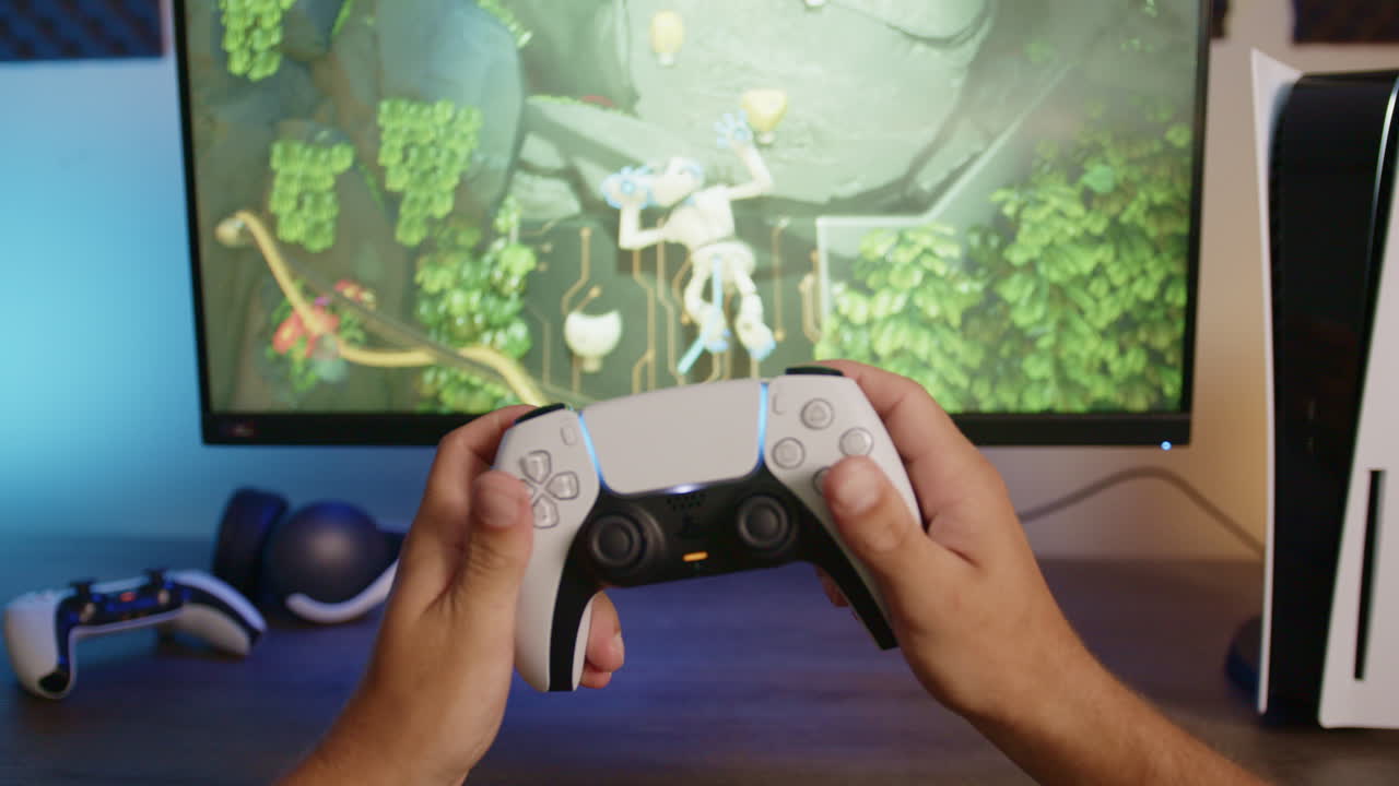 niño jugando en una playstation 5 con un controlador en una habitación led rgb por la noche, punto de vista