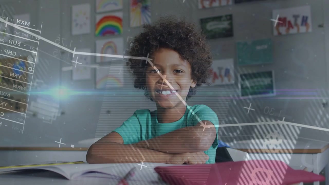 Male student sitting at desk in classroom, animated graphs sweeping across view, smile broadening