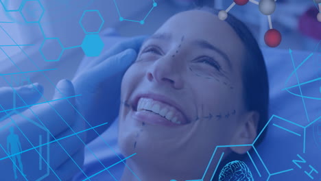 animation of chemical formula over surgeon preapring patient for surgery