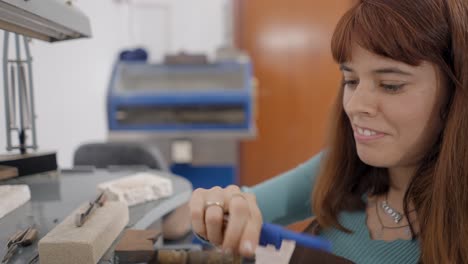 woman jewelry artist at work