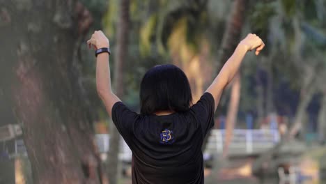 woman exercising in a park