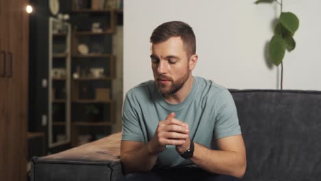 close-up portrait of a young man with expressed emotions of experience