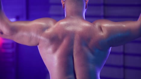 muscular man working out with a barbell
