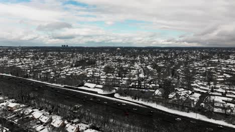 an aerial view of the southern state parkway on long island, ny on a cloudy winter day