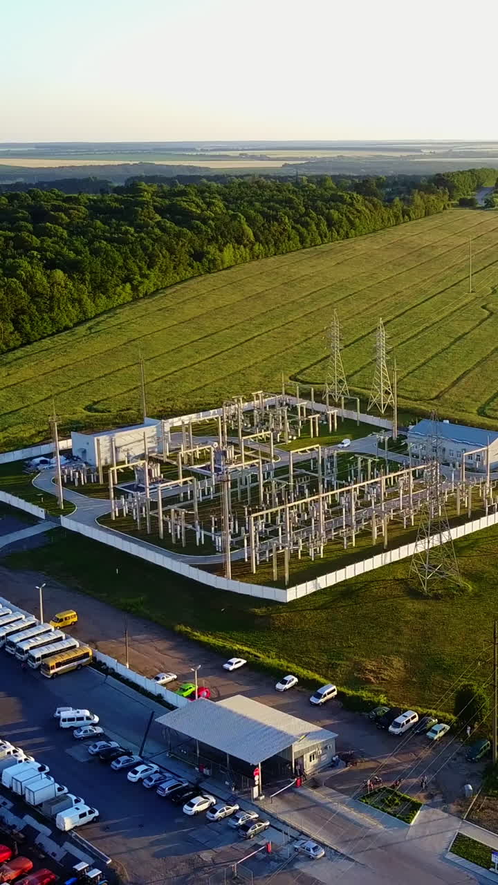 Industrial Factories And Buildings. Industrial estate land development aerial view Vertical video