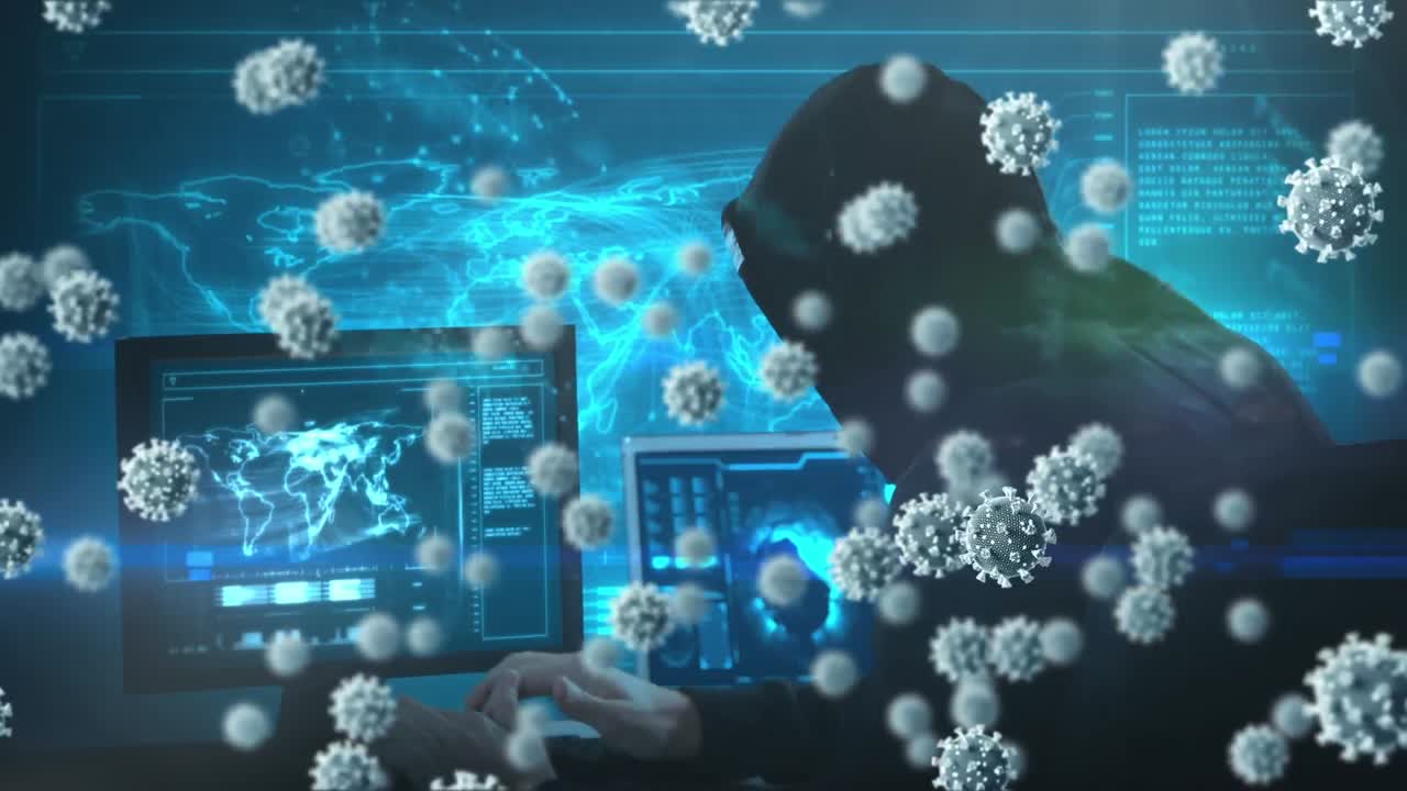 animación de células macro covid19 sobre un hombre con capucha, usando una computadora portátil
