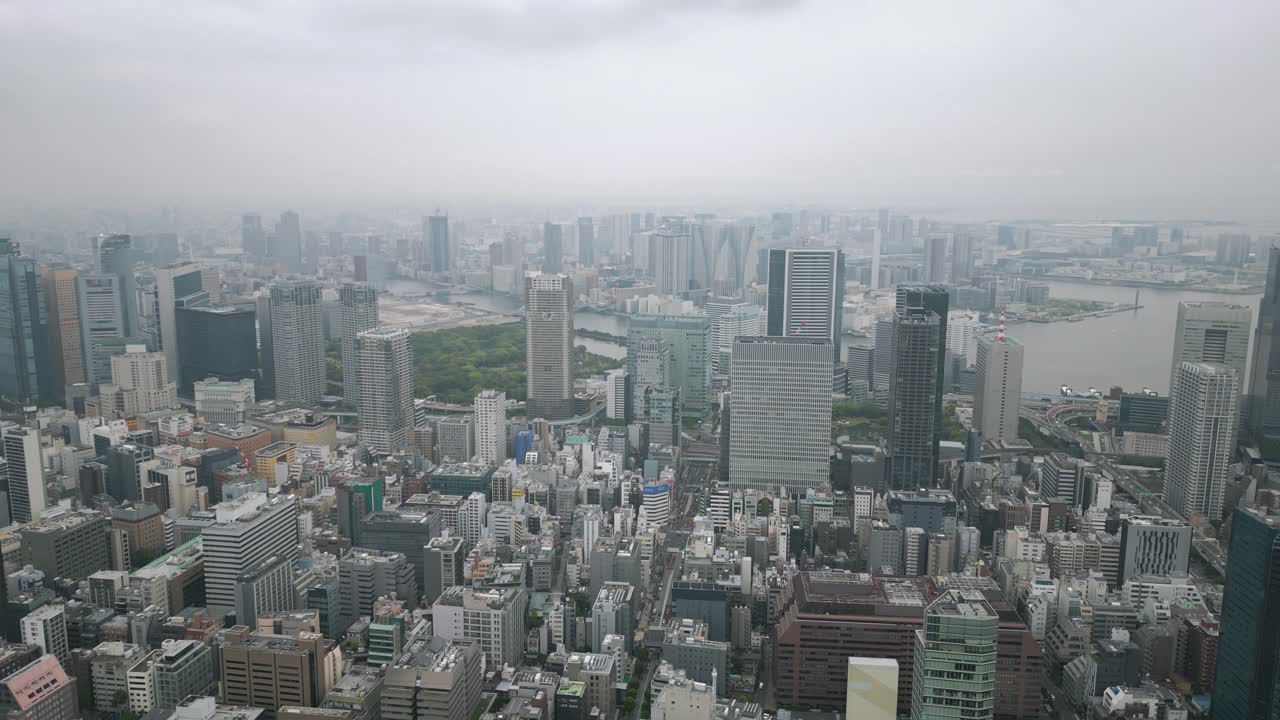 Aerial Scenic Urban Drone Footage of Buildings and Skyscrapers in Downtown Tokyo in the Capital City of Tokyo, Japan