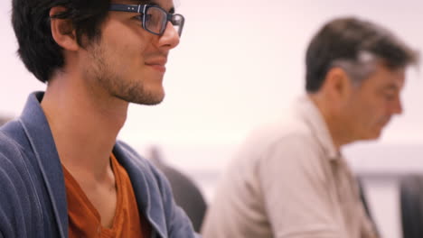 Student-and-teacher-working-on-computer