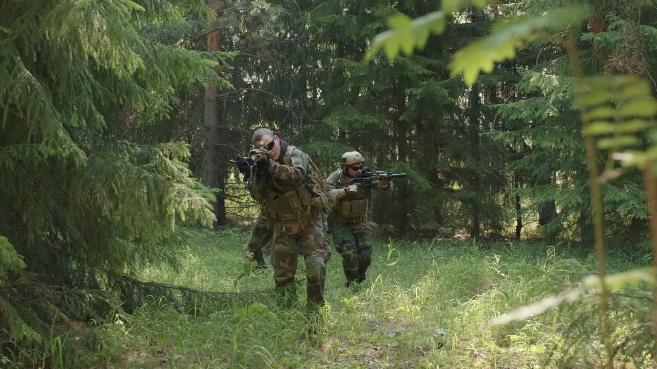 Soldiers With Rifles On Military Operation