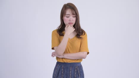 ストレスを感じる アジアの若い女性