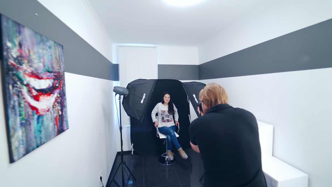 Studio photosession process. Professional photography studio showing behind the scenes