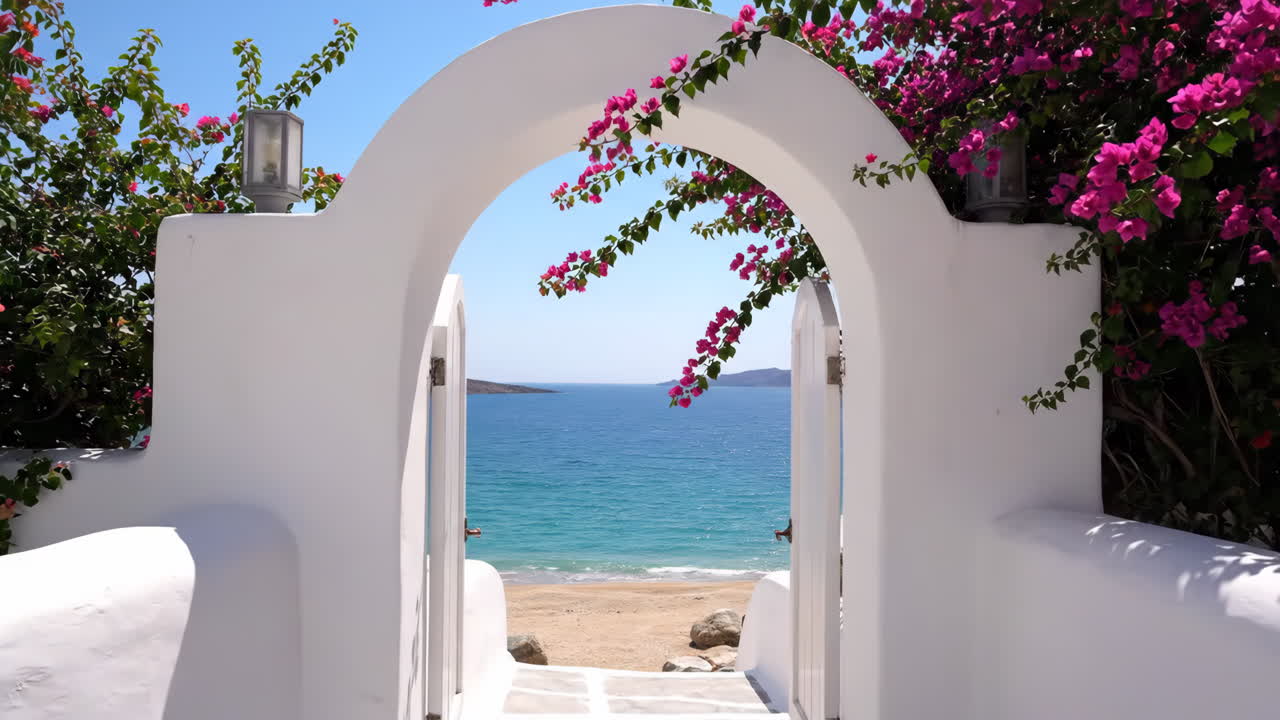 White Archway Leading to a Secluded Beach with Bougainvillea