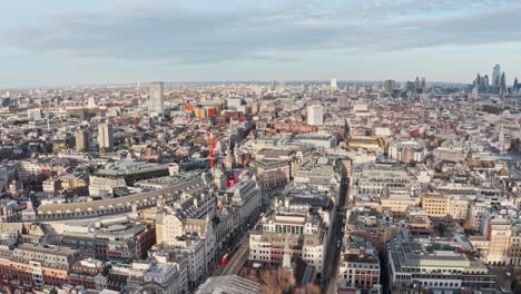 drone shot over london westminster piccadilly circus sunset