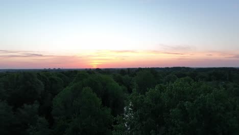 dropping down from a sunset to a dutch canal