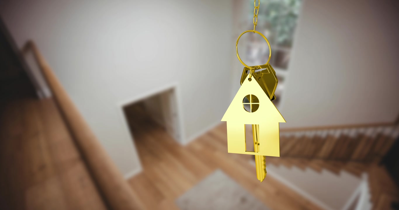 Animazione di chiave d'oro e portachiavi a forma di casa su interno di casa sfocato