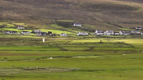 kitesurfing on streams though lush peatlands of achill island, ireland