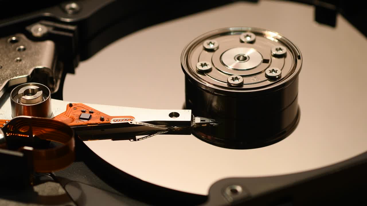 Hard Disk Drive, Close up of a hard disk drive reading and writing data