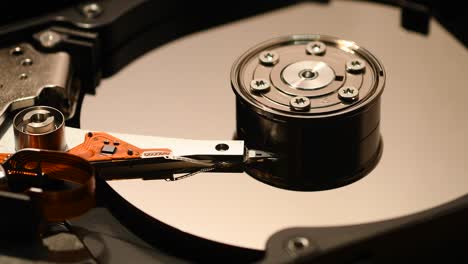 hard disk drive, close up of a hard disk drive reading and writing data