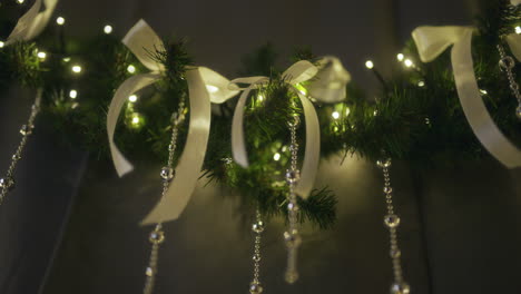 close-up of shiny baubles and lights on a decorated christmas tree