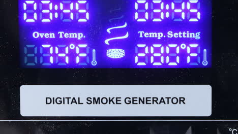 close up of a digital smoke generator in the kitchen