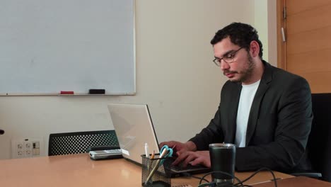 businessman concentrating on laptop task