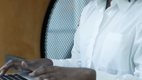 focused young businesswoman working with laptop