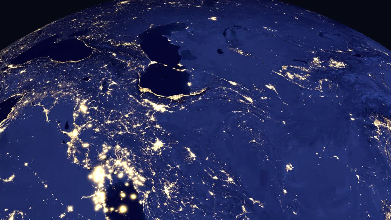 Digital animation zooms from deep space into a glowing night view of Tehran, Iran