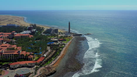 aerial view of tropical beach on the island gran canaria, spain. beautiful tropical island with sand beach, palm trees. tropical landscape: beach with palm trees.ocean, sky, sea.