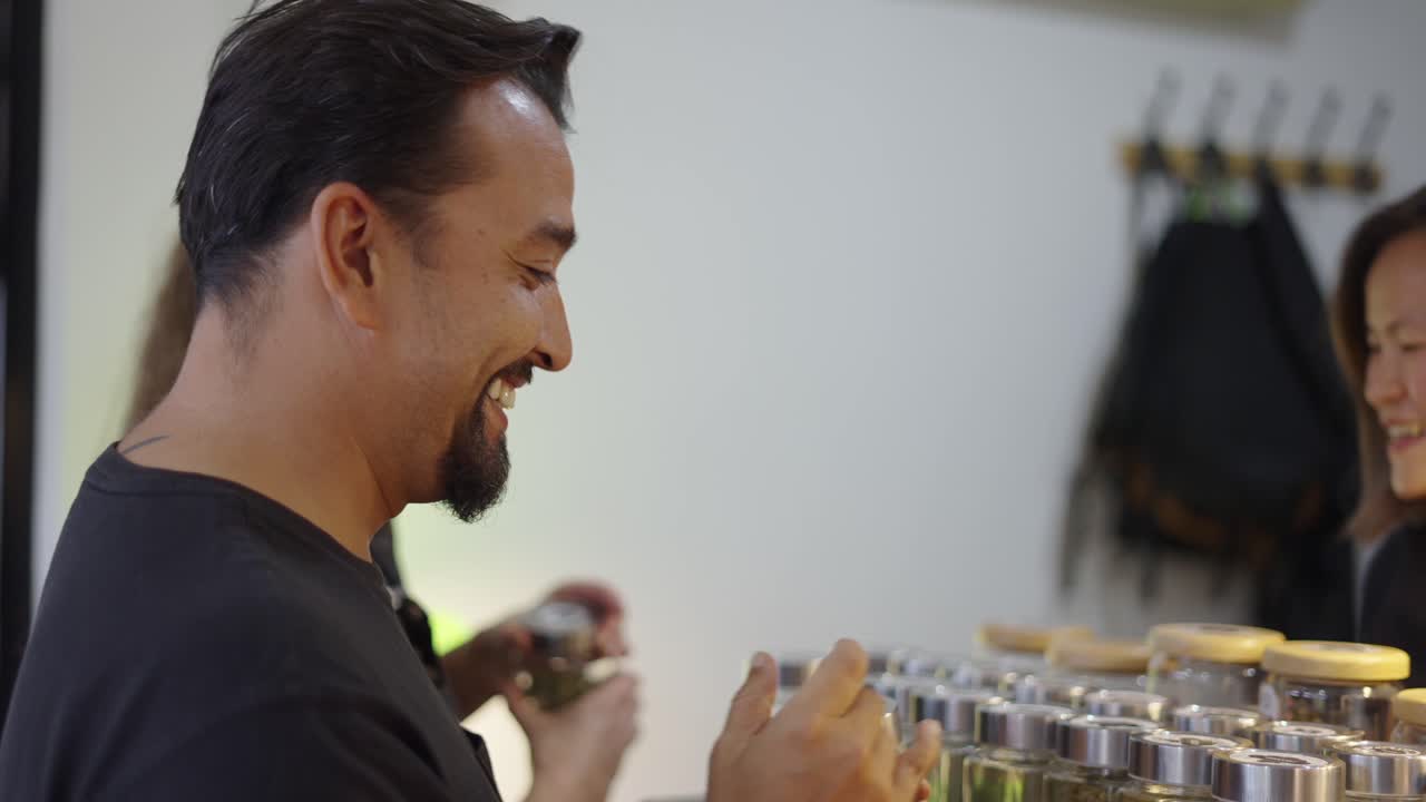 People browsing cannabis products in a dispensary