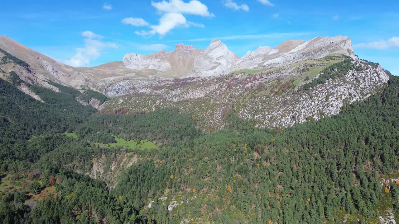Majada de gabardito near canfranc with lush forests and rocky mountains in aragón spain, aerial view