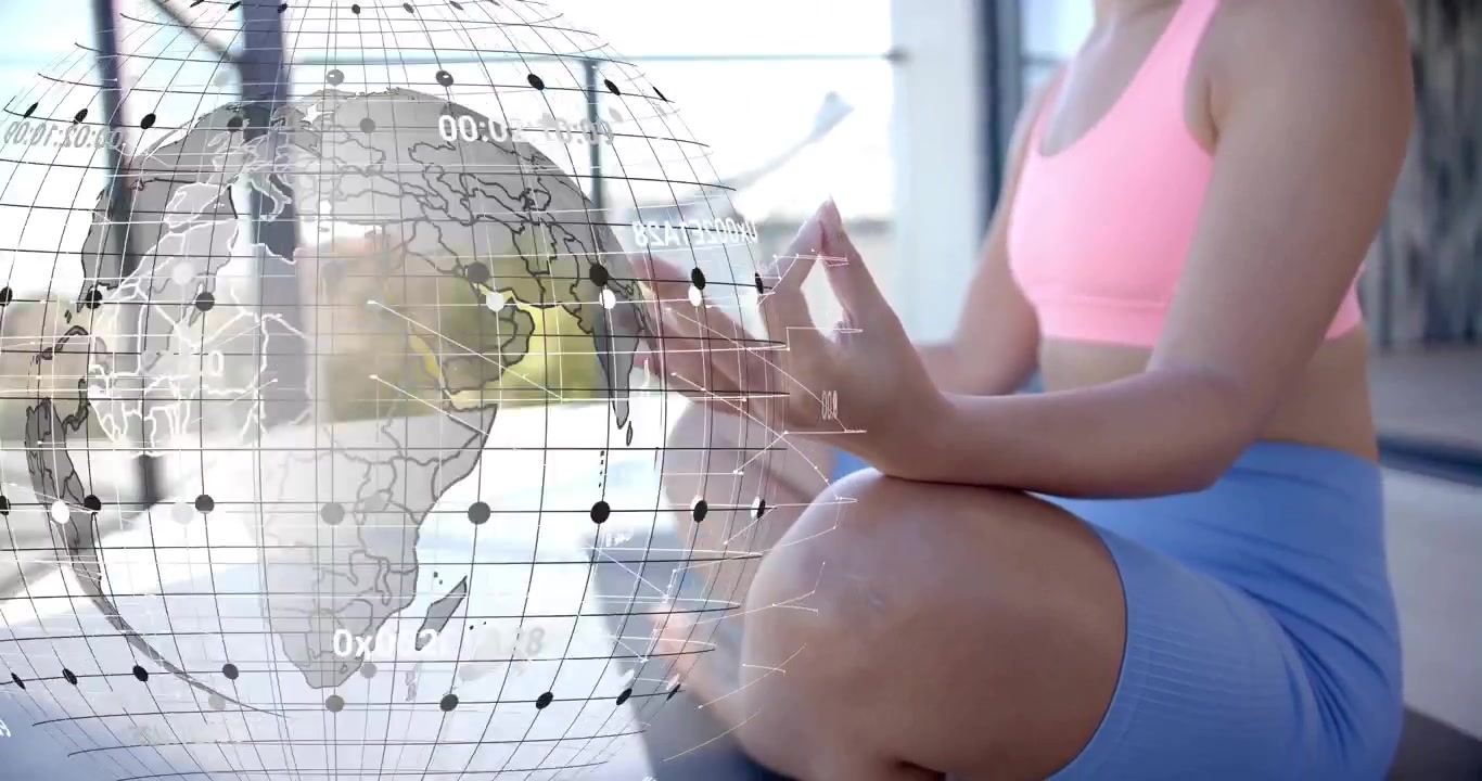 Mulher iogue segurando um mudra ao lado de um globo 3D que aparece e gira, exibindo dados de saúde para foco.