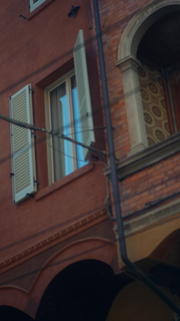 Building Exterior with Windows and Shutters