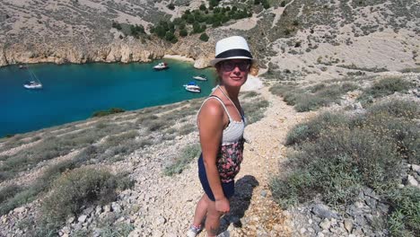 female traveler posing at picturesque krk island croatia