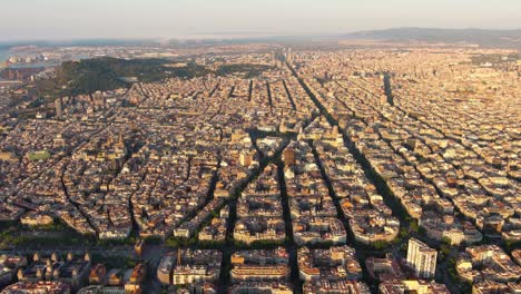 aerial view of typical buildings of barcelona cityscape. eixample residential famous urban grid. (catalonia, spain)